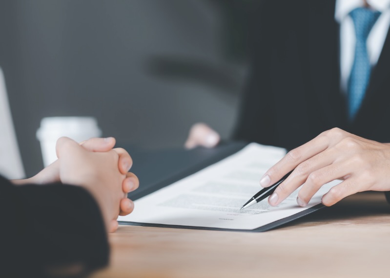 Man signing document